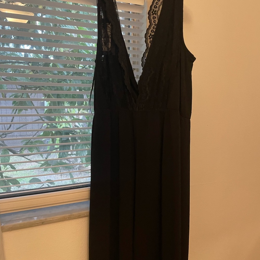 Never worn romper. - Picture 2 of 3